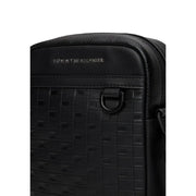 Sac bandoulière Tommy Hilfiger pour homme, noir, en cuir tissé texturé avec logo discret en relief sur polyuréthane.