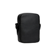 Sac bandoulière en cuir noir texturé au design minimaliste et élégant, sac à bandoulière Tommy Hilfiger pour homme en polyuréthane