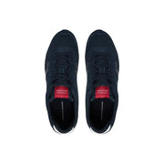 Bleu marine foncé Tommy Hilfiger Baskets pour hommes en polyester avec logo rouge et semelles en caoutchouc blanc.