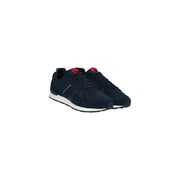 Tommy Hilfiger Baskets homme bleues en polyester avec empiècements en mesh suédé bleu marine foncé, logo rouge et semelles en caoutchouc blanc.