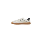 Tommy Hilfiger Baskets pour homme en cuir suédé blanc avec des détails noirs et une semelle en caoutchouc beige pour un style décontracté