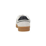 Tommy Hilfiger Baskets pour hommes en cuir blanc avec empiècements en daim blanc, languette arrière noire et semelle en gomme texturée.