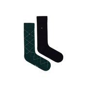 A pair of tommy hilfiger men socks cotton 2 pack with one dark green argyle and one solid black featuring logo