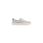 Mocassins en daim gris clair avec semelle en caoutchouc blanc et languette arrière bleu marine de Tommy Hilfiger chaussures printemps-été pour hommes