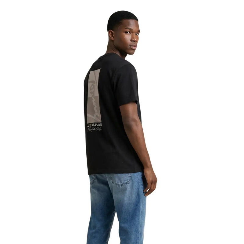 Back side of a black tommy hilfiger jeans men t-shirt with a vertical muted graphic print and jeans text