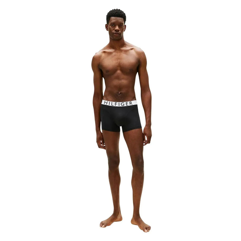 Black tommy hilfiger men trunks in cooling tech nylon with white waistband featuring black logo lettering