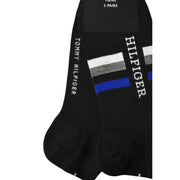 Chaussettes Tommy Hilfiger noires pour homme, en mélange de coton, avec des rayures blanches et bleues, pour un style décontracté.