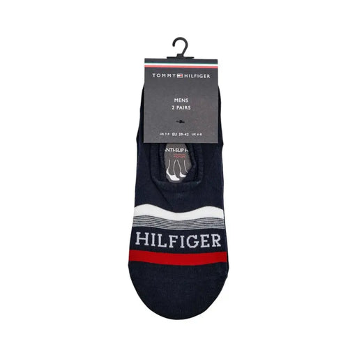 Chaussettes invisibles Tommy Hilfiger pour homme, bleu marine foncé, à rayures blanches et rouges et à large bande blanche portant le nom de la marque.
