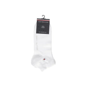 Chaussettes blanches pour hommes Tommy Hilfiger avec un logo discret rouge et bleu sur le pied pour un usage quotidien