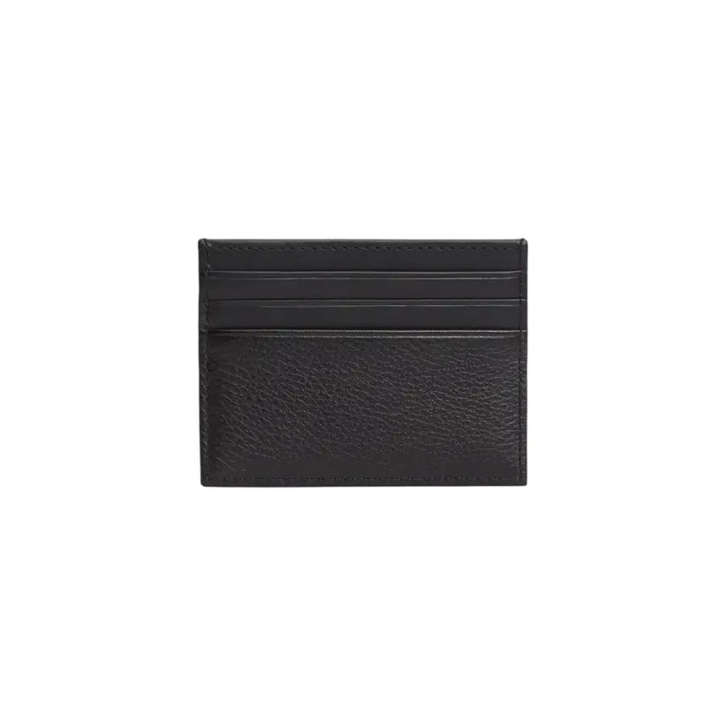 Tommy Hilfiger Portefeuille homme en cuir noir avec porte-cartes, surface texturée et bords cousus.