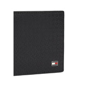 Tommy Hilfiger Portefeuille homme en cuir noir texturé, orné d'un discret motif losanges et du logo dans un coin.