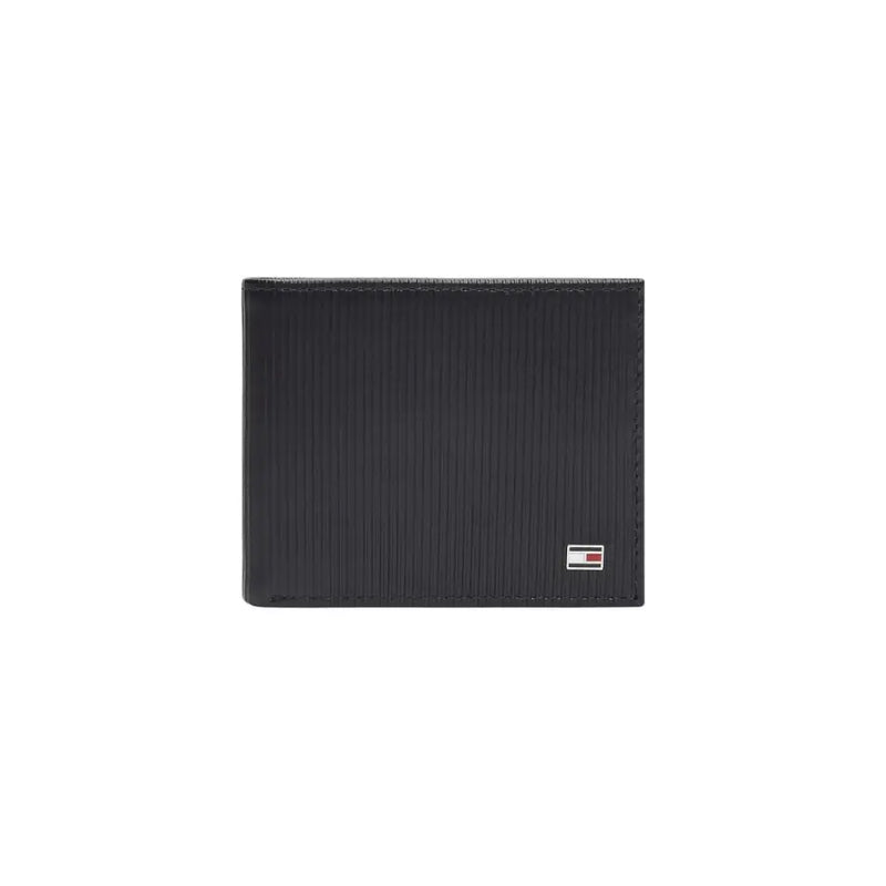 Portefeuille homme Tommy Hilfiger noir texturé avec un petit logo rectangulaire dans le coin inférieur droit (côté visible)