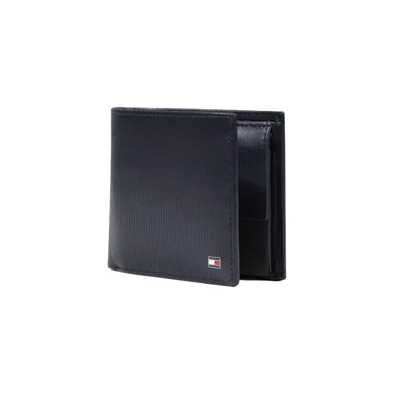 Tommy Hilfiger Portefeuille homme en cuir noir texturé avec un petit logo rouge, blanc et bleu dans le coin inférieur droit