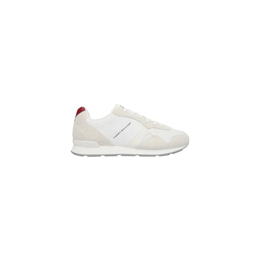 Tommy Hilfiger Baskets montantes blanches en polyester pour homme, avec languette rouge au talon et subtils détails gris.