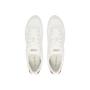 Tommy Hilfiger Baskets blanches pour homme en polyester, à lacets, avec de subtils détails rouges au talon et un design minimaliste épuré.