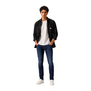 Veste en jean noir avec petite Tommy Hilfiger Écusson logo sur la poitrine gauche en coton biologique pour hommes