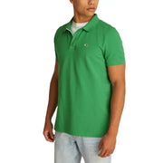 Tommy Hilfiger Polo d'été vert pour homme, avec col intérieur blanc et petit logo sur la poitrine, idéal pour une tenue décontractée.