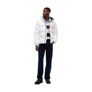 Tommy Hilfiger Doudoune Essential Down pour femme, blanche, matelassée avec fermeture éclair noire, vue de face