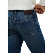 Tommy Hilfiger Jean slim pour homme en denim bleu foncé, cinq poches et logo brodé au dos