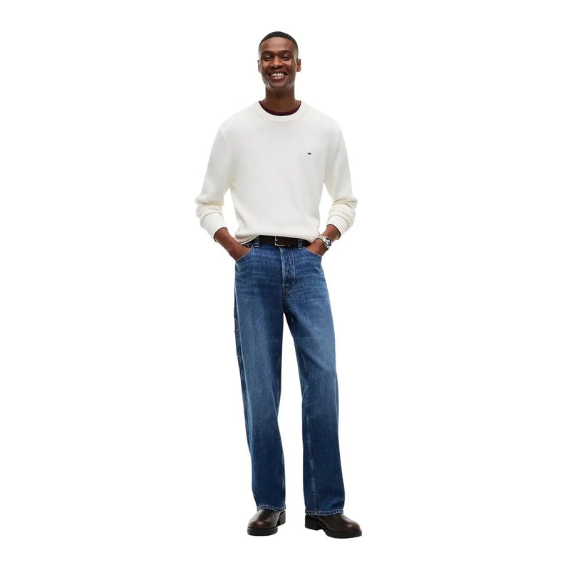 Pull slim Tommy Hilfiger pour homme en denim bleu, coupe droite et coutures classiques, vue de face