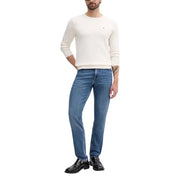 Tommy hilfiger men’s slim fit jeans in light blue wash.