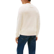 Cream-colored crew neck sweater with ribbed cuffs and hem, likely made of cotton or wool blend.