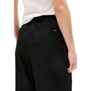 Black tommy hilfiger wide-leg organic cotton trousers with elastic waistband and logo patch on the back pocket back view