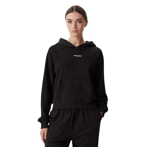 Tommy Hilfiger Sweat-shirt noir pour femme en coton biologique avec un logo blanc discret et des bords-côtes aux poignets et à la taille.