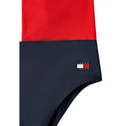 Tommy hilfiger women blue beachwear scoop neck nylon swimwear shown with red and navy blue two-tone Tommy jeans swim trunks