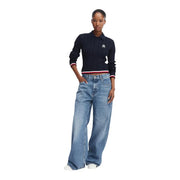 Pull polo bleu marine en maille torsadée avec poignets et ourlet rayés rouges et blancs, en coton biologique. Tommy Hilfiger
