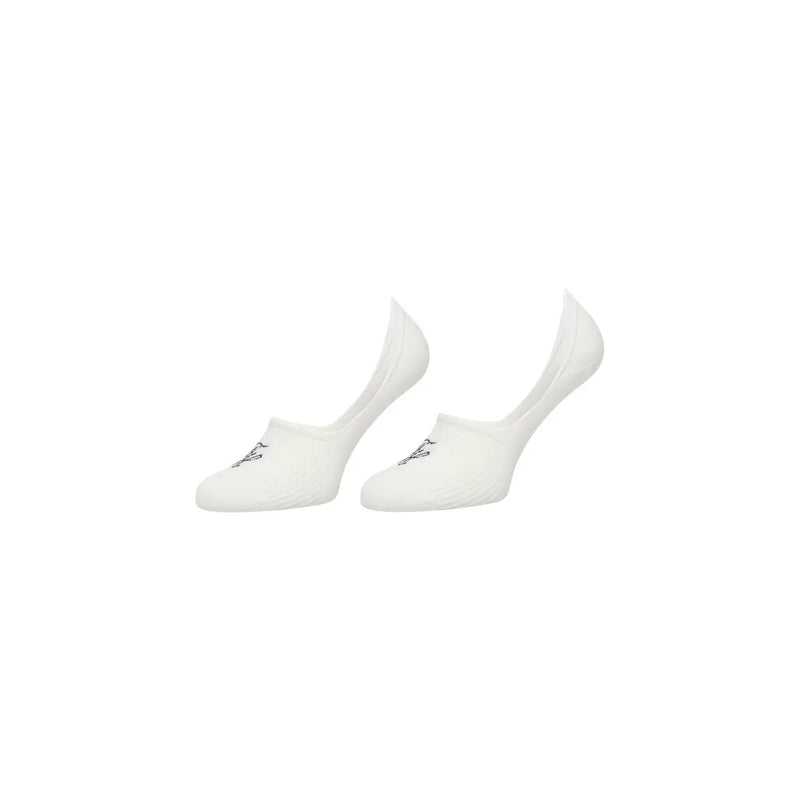 Tommy Hilfiger Chaussettes basses blanches en coton pour femmes, lot de 2, longueur cheville, avec un logo noir discret sur le bout.