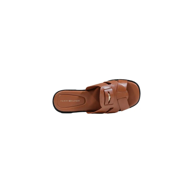 Tommy Hilfiger women leather slippers in brown with woven leather strap and black rubber sole slide sandal design