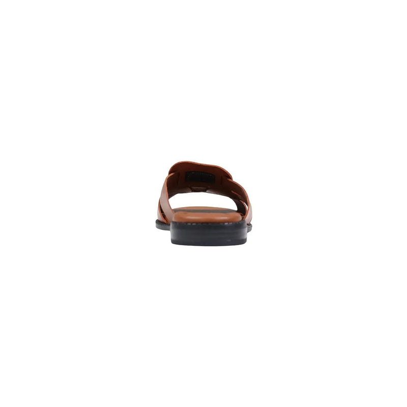 Tommy Hilfiger women leather slippers in brown featuring a brown leather slide upper with a black rubber sole