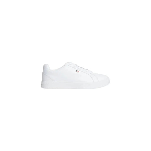 Tommy Hilfiger Baskets en cuir blanc pour femmes, au design minimaliste épuré et au logo discret sur le côté.