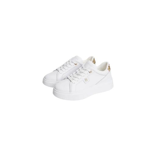 Tommy Hilfiger Baskets compensées blanches en cuir pour femmes, ornées de détails dorés et au design minimaliste et élégant.