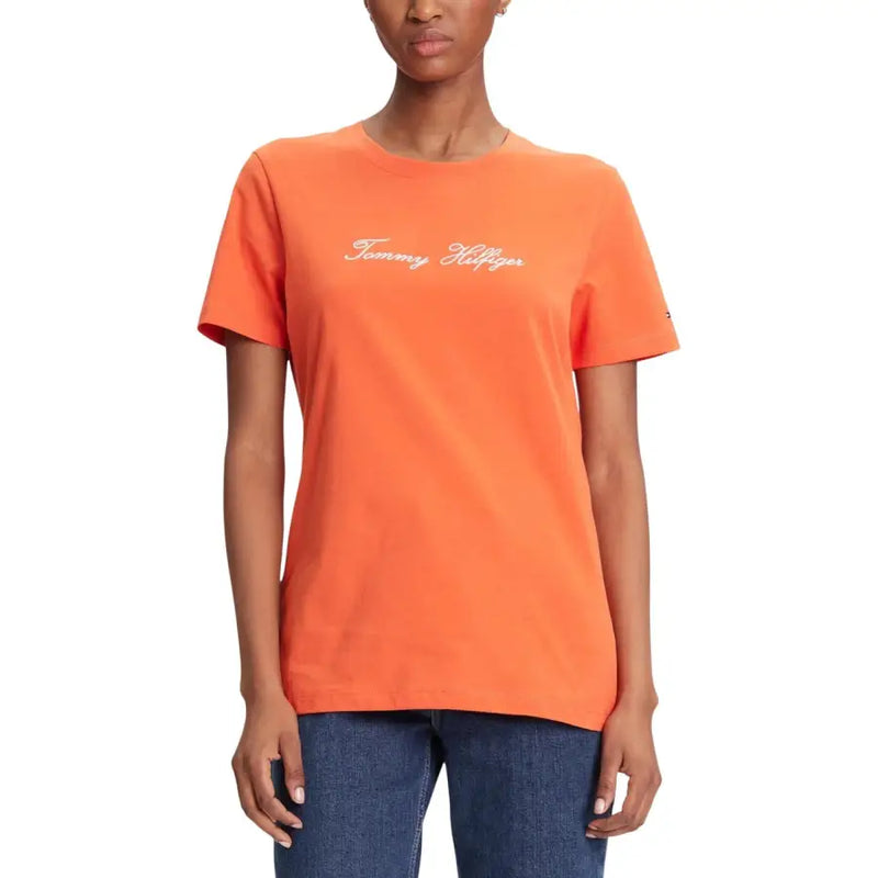 Bright orange tommy hilfiger women organic cotton t-shirt with white cursive logo across the chest
