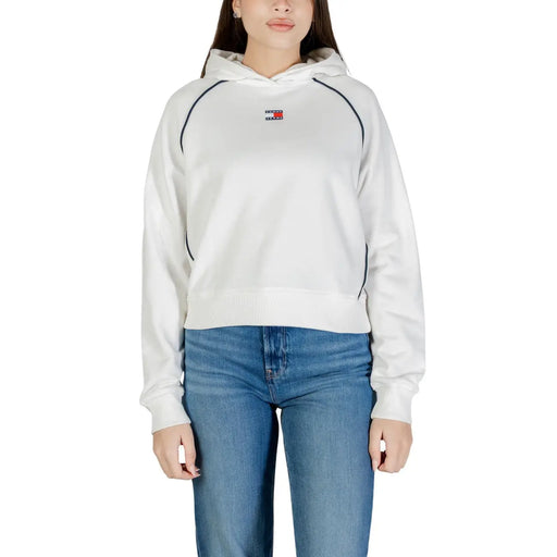 Tommy Hilfiger Sweat à capuche blanc en coton biologique pour femme, avec surpiqûres noires contrastantes et petit logo sur la poitrine.