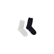 Une paire de chaussettes Tommy Hilfiger pour femme, l'une blanche à pois noirs et l'autre bleu marine, en mélange de coton, taille S.