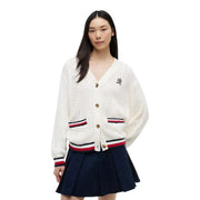 Tommy Hilfiger women white organic cotton cable knit cardigan with red white and navy striped trim on cuffs waistband and pockets