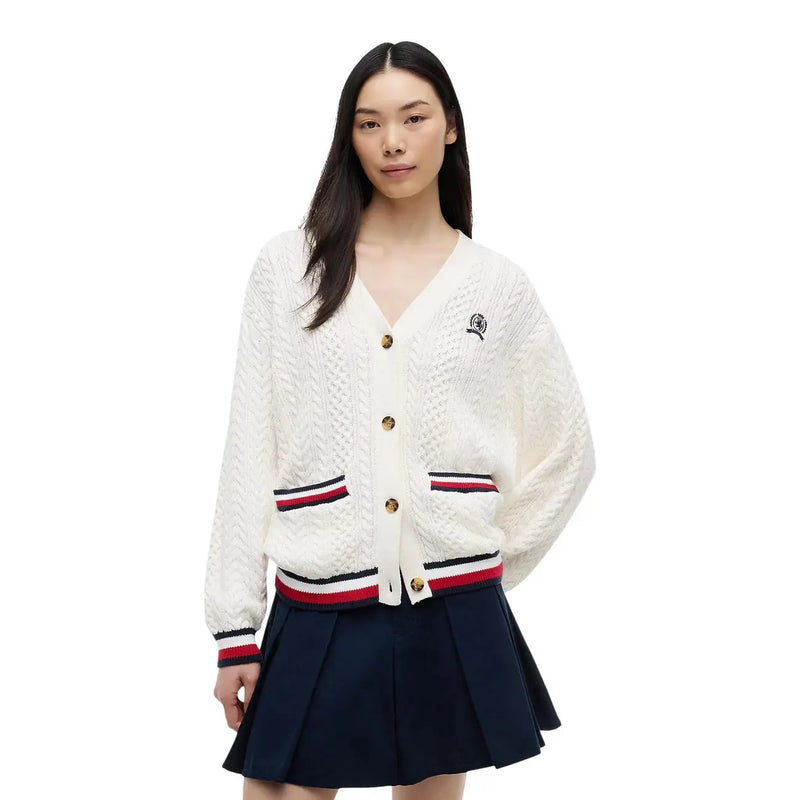 Tommy Hilfiger women white organic cotton cable knit cardigan with red white and navy striped trim on cuffs waistband and pockets