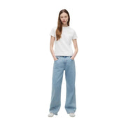 Light blue wide-leg denim jeans paired with tommy hilfiger women white organic cotton short t shirt front view