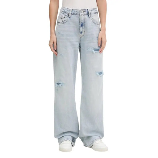 Tommy Hilfiger women’s light blue light-wash denim jeans with distressed ripped details and high-rise wide-leg cut
