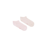 A pair of tommy hilfiger women’s pink cotton ankle socks with soft texture and small red branding on the side