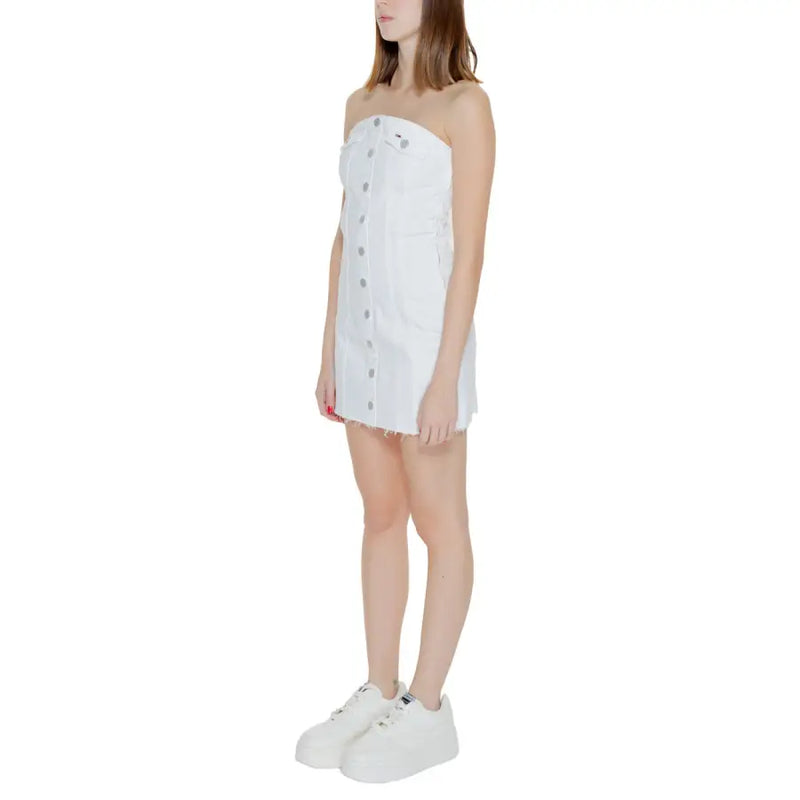 Tommy Hilfiger women’s white cotton strapless denim mini dress with button front and frayed hem