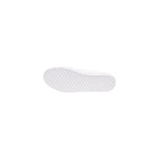 Tommy Hilfiger women’s white cotton sneakers with a white rubber sole featuring a textured grid-like pattern