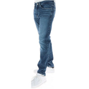 Jean Tommy Jeans pour homme en denim bleu classique, coupe droite et délavage subtil sur le devant