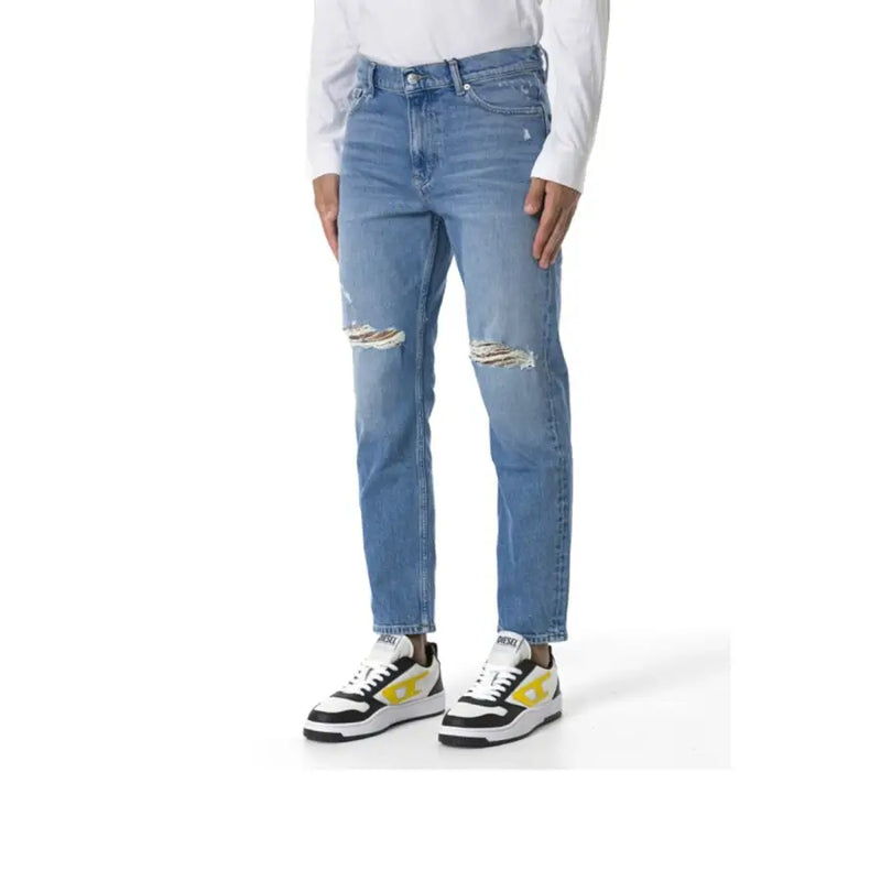 Tommy Jeans men blue cotton stretch light-wash denim jeans with distressed frayed knee holes and straight-leg cut