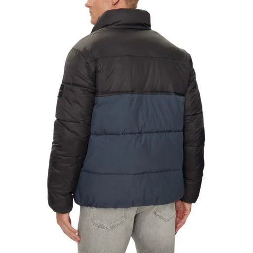 Two-tone puffer jacket showcasing a stylish design for winter fashion enthusiasts