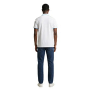 Polo homme US Polo Assn blanc, coupe classique, 100% coton, avec liseré bleu clair au col et aux poignets, taille L