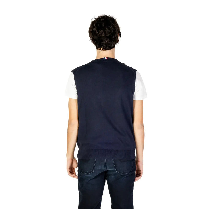 Navy blue knit vest with ribbed hem and collar over white t-shirt u.s. polo assn. men’s gilet at urban city styles